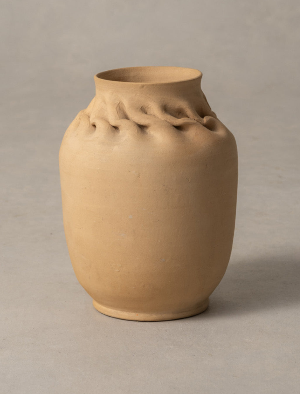 George E. Ohr, Large Buff Bisque Vase with In-Body Twist, circa 1898-1910 (GOEA02)