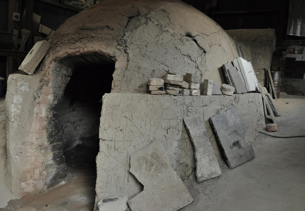 PIECES ARE FIRED IN A KILN SITUATED AT THE HEART OF THEIR FAMILY PROPERTY, BUILT BY HIS FATHER AT THE TIME OF HIS BIRTH. BOTH FATHER AND SON FIRE IN THIS INCREDIBLE 40-YEAR-OLD, 3-ROOMED, NOBORIGAMA KILN.